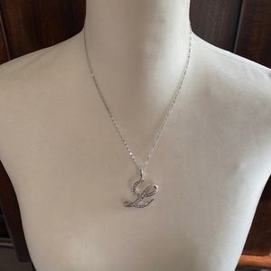 Nolan Miller initial L silver tone necklace